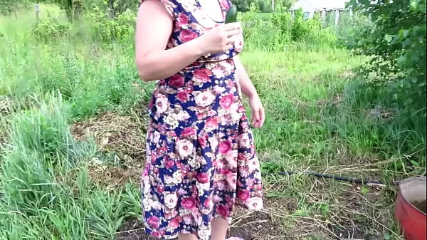 Big Busty milf masturbates with cucumber and strawberries outdoors in a public place Juicy PAWG and big tits in nature Fetish total Videos